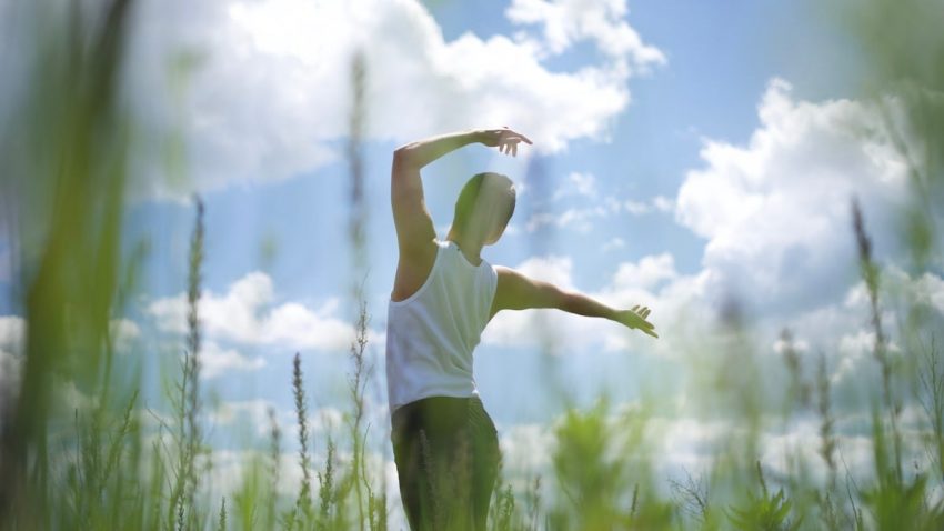 a man standing in a field